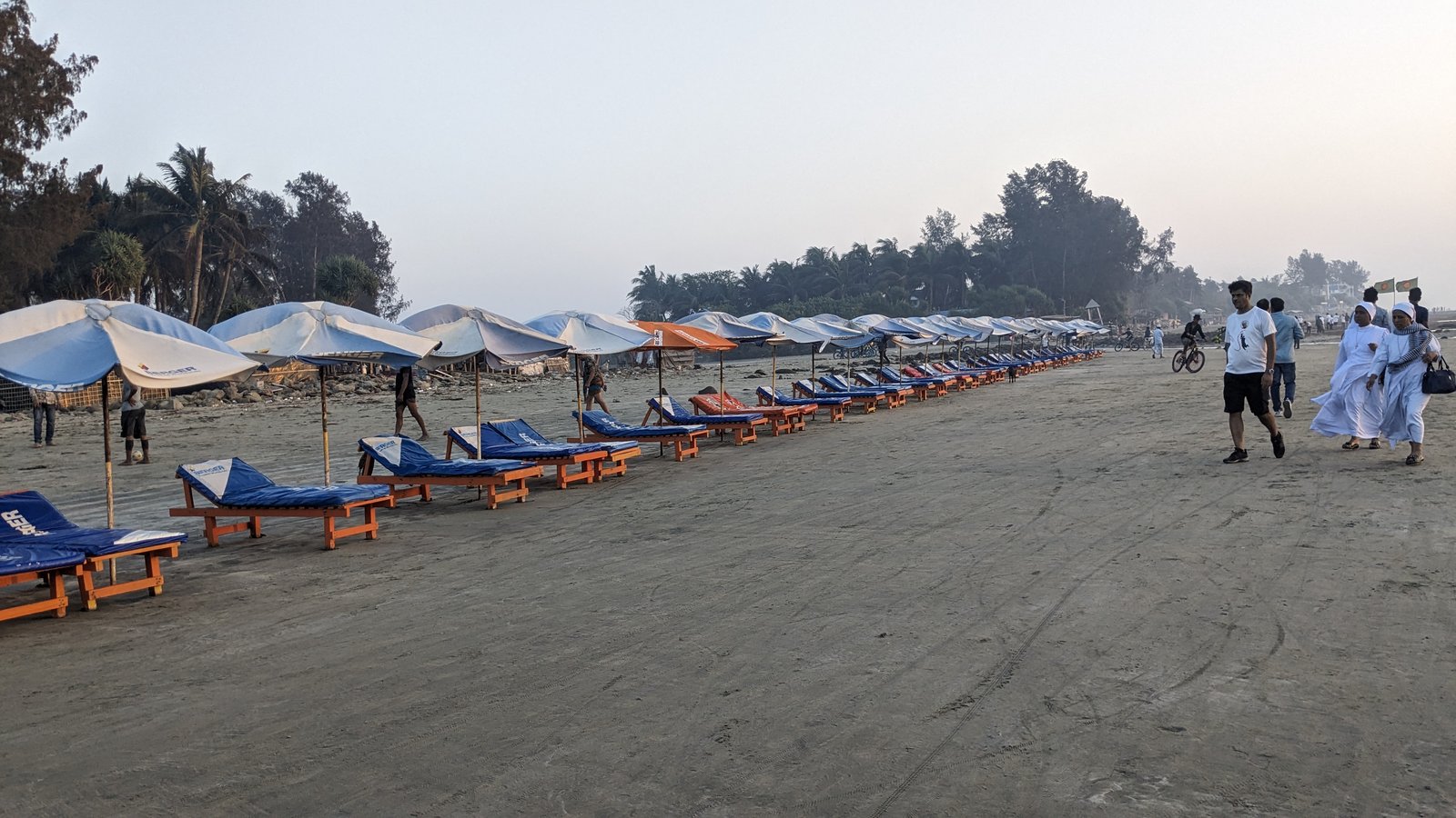 Saint Martin's Island beach, Cox's Bazar, with boats and palm trees