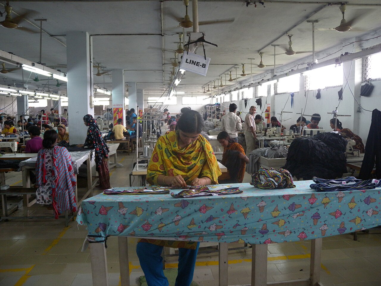 Workers at a garment factory assembly line in Bangladesh