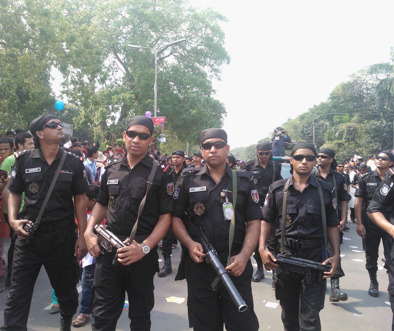 Armed Rapid Action Battalion personnel on patrol in Dhaka